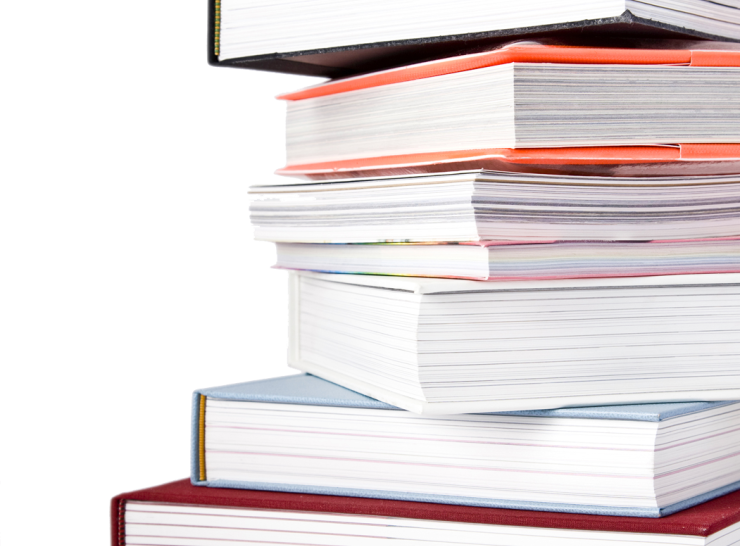 Explore ECN publications A stack of books against a white background